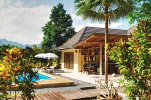 low angle photograph of a single storey courtyard house with swimming pool