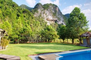 villa pool, lawn, garden and mountain views