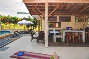 Villa courtyard opens to patio and swimming pool