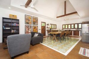 Living area and dining table in an open plan kitchen